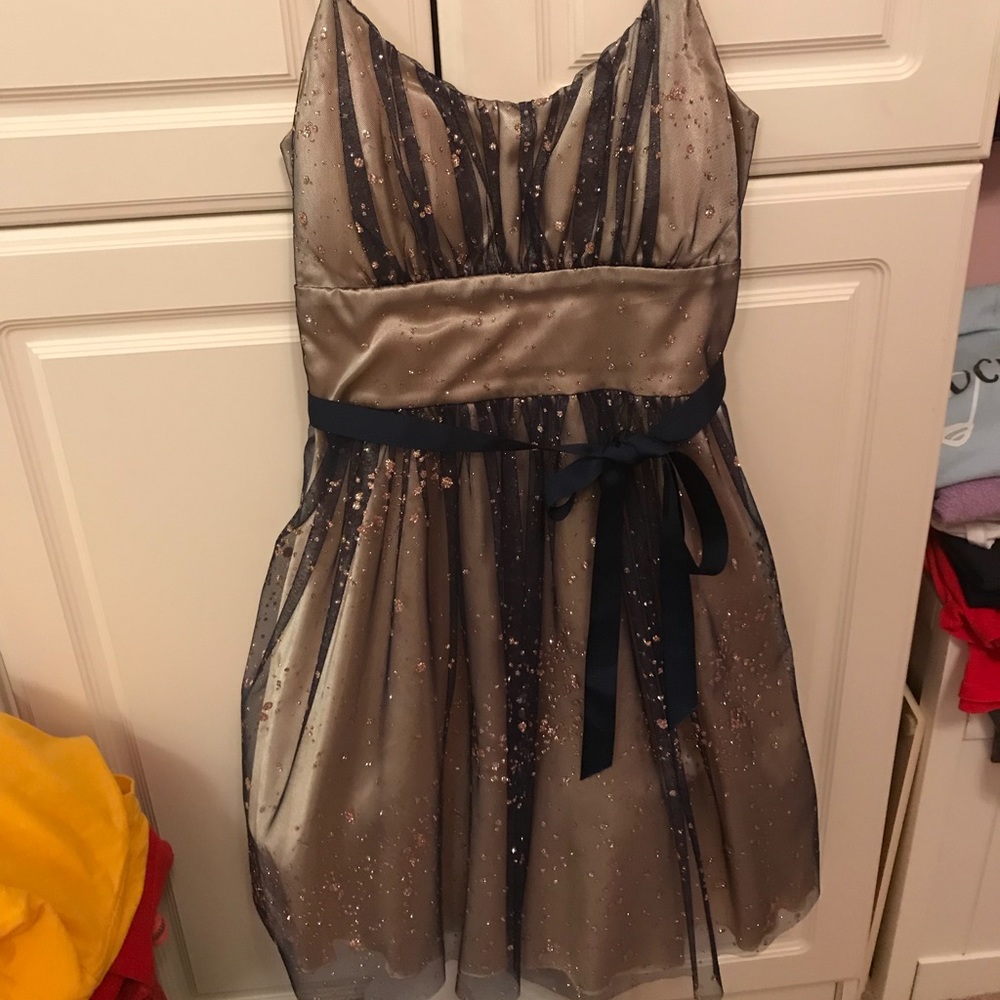 dEliA’s gold and navy short prom dress